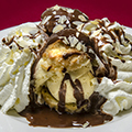 Profiteroles (chou puffs) with hot chocolate