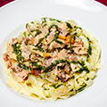 Tagliatelle with preserved rabbit and basil